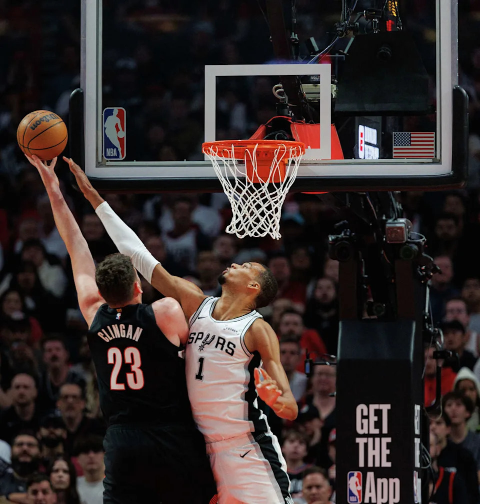San Antonio Spurs forward Victor Wembanyama (1) blocks a shot from Portland Trail Blazers center Donovan Clingan (23) during the first quarter of Game 4 of a first-round NBA playoff series at Moda Center on Sunday, April 26, 2026. (Sam Owens/San Antonio Express-News)