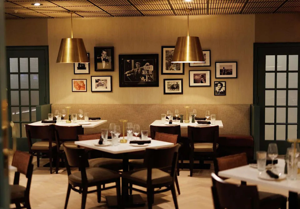 Inside the former Crowne Plaza in Addison, the sizeable hotel has a redesigned lobby, pool and restaurant. Top Brass is the American bistro inside Addison's new Hotel Dax. (Nathan Hunsinger/The Dallas Morning News)