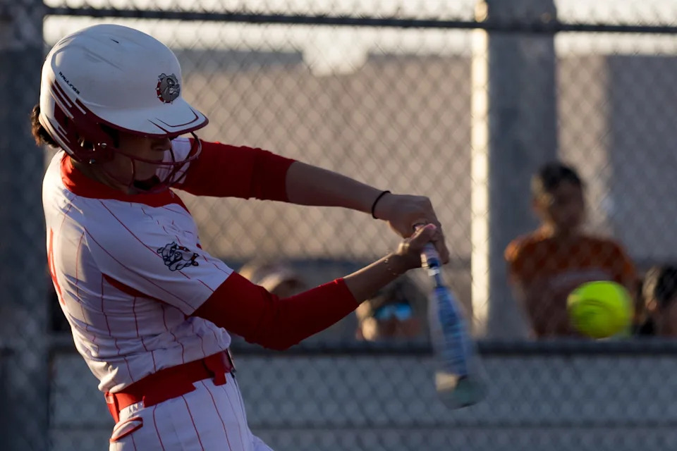 Socorro’s Danielle Lozoya (4) hits the ball during a District 1-6A game against Eastlake at Eastlake High School on Tuesday, March 17, 2026, in El Paso, Texas.