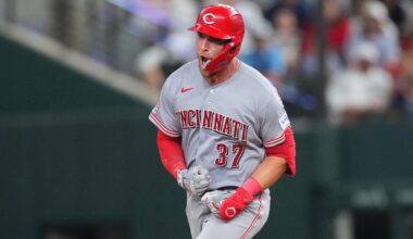 Reds beat Rangers 5-3 in their 1st road game with 3 homers, the last in the 9th |