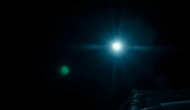 An extreme close-up photograph of a boat motor or other nautical equipment, lit dramatically with a harsh flash to create a stark, gritty, investigative aesthetic, conceptually representing the crackdown on a human smuggling operation.