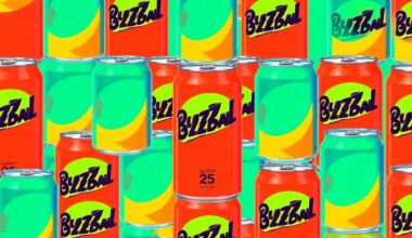 A highly stylized, abstract silkscreen print featuring a repeating grid of neon pink, yellow, and blue BuzzBall beverage cans, conceptually representing the vibrant and playful energy of the oversized BuzzBall display.