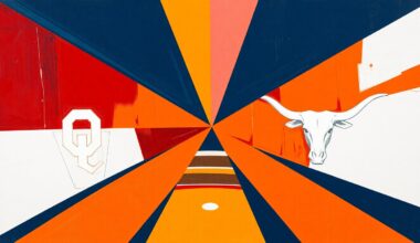 A fragmented, geometric painting depicting a softball game between OU and Texas, with sharp planes of crimson, orange, and blue overlapping to create a sense of motion and competition.