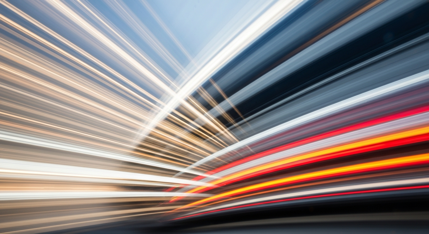 An abstract, colorful image with sweeping, blurred lines representing the motion of a vehicle, conveying the speed and energy of the automotive industry.