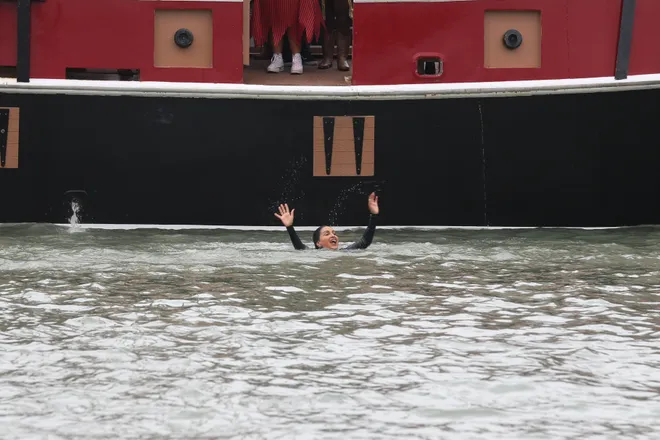 Mayor Paulette Guajardo cheers to a crowd of people after the Dunking of the Mayor event for Buc Days in Corpus Christi Bay May 2, 2024.