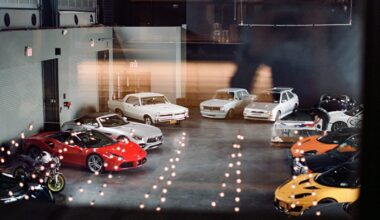 a group of cars parked in a garage