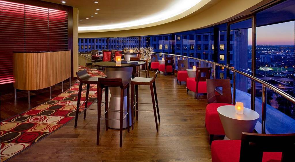 Image shows the interior of Spindletop restaurant in Houston at Hyatt Regency. 