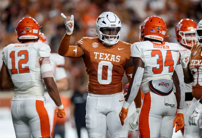 AUSTIN, TEXAS - SEPTEMBER 20: Anthony Hill Jr. #0 of the Texas Longhorns reacts after a tackle in the second quarter against Landan Brown #34 of the Sam Houston State Bearkats at Darrell K Royal-Texas Memorial Stadium on September 20, 2025 in Austin, Texas. (Photo by Tim Warner/Getty Images)