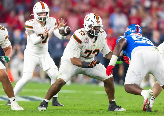 Jan 8, 2026; Glendale, AZ, USA; Miami Hurricanes offensive lineman Anez Cooper (73) against the Mississippi Rebels during the 2026 Fiesta Bowl and semifinal game of the College Football Playoff at State Farm Stadium. Mandatory Credit: Mark J. Rebilas-Imagn Images