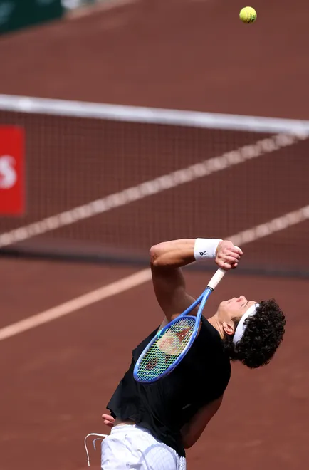 HOUSTON, TEXAS - MARCH 31: Ben Shelton of the United States serves to Marcelo Demoliner of Brazil and Robert Galloway of the United States while playing with Andrés Andrade of Equador in the Men's Doubles Quarterfinals on Day 2 of the Fayez Sarofim & Co. U.S. Men's Clay Court Championship at the River Oaks Country Club on March 31, 2026 in Houston, Texas. (Photo by Kenneth Richmond/Getty Images)