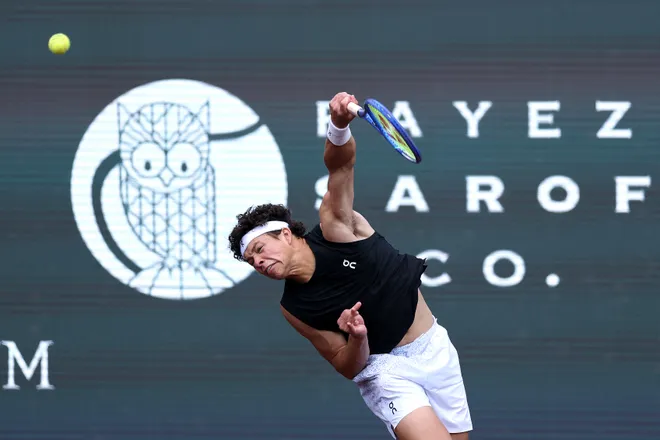 HOUSTON, TEXAS - MARCH 31: Ben Shelton of the United States serves to Marcelo Demoliner of Brazil and Robert Galloway of the United States while playing with Andrés Andrade of Equador in the Men's Doubles Quarterfinals on Day 2 of the Fayez Sarofim & Co. U.S. Men's Clay Court Championship at River Oaks Country Club on March 31, 2026 in Houston, Texas. (Photo by Kenneth Richmond/Getty Images)