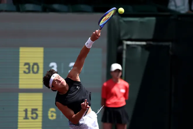 HOUSTON, TEXAS - MARCH 31: Ben Shelton of the United States serves to Marcelo Demoliner of Brazil and Robert Galloway of the United States while playing with Andrés Andrade of Equador in the Men's Doubles Quarterfinals on Day 2 of the Fayez Sarofim & Co. U.S. Men's Clay Court Championship at the River Oaks Country Club on March 31, 2026 in Houston, Texas. (Photo by Kenneth Richmond/Getty Images)
