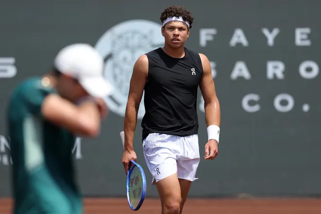 HOUSTON, TEXAS - MARCH 31: Ben Shelton of the United States reacts against Marcelo Demoliner of Brazil and Robert Galloway of the United States while playing with Andrés Andrade of Equador in the Men's Doubles Quarterfinals on Day 2 of the Fayez Sarofim & Co. U.S. Men's Clay Court Championship River Oaks Country Club on March 31, 2026 in Houston, Texas. (Photo by Alex Slitz/Getty Images)