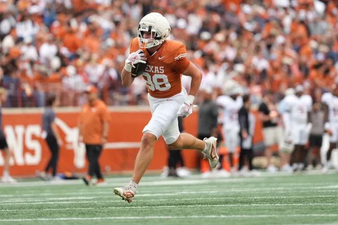 AUSTIN, TEXAS - APRIL 18: Charlie Jilek #88 of the Texas Longhorns runs for yardage ahead of Kosi Okpala #18 after making a catch during the Texas Spring Football Game at Darrell K Royal-Texas Memorial Stadium on April 18, 2026 in Austin, Texas. (Photo by Scott Wachter/Getty Images for ONIT)