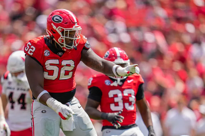 Sep 9, 2023; Athens, Georgia, USA; Georgia Bulldogs defensive lineman Christen Miller (52) reacts after making a tackle against the Ball State Cardinals during the second half at Sanford Stadium. Mandatory Credit: Dale Zanine-USA TODAY Sports