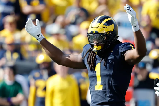 Oct 4, 2025; Ann Arbor, Michigan, USA; Michigan Wolverines linebacker Jaishawn Barham (1) reacts in the second half against the Wisconsin Badgers at Michigan Stadium. Mandatory Credit: Rick Osentoski-Imagn Images