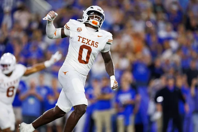 Texas Longhorns linebacker Anthony Hill Jr. celebrates.