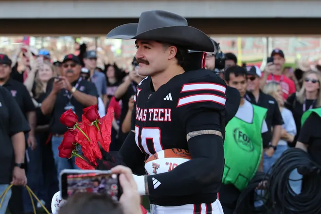 Nov 15, 2025; Lubbock, Texas, USA; Texas Tech Red Raiders defensive back Jacob Rodriguez (10) celebrates senior day before the game against the Central Florida Knights at Jones AT&T Stadium. Mandatory Credit: Michael C. Johnson-Imagn Images