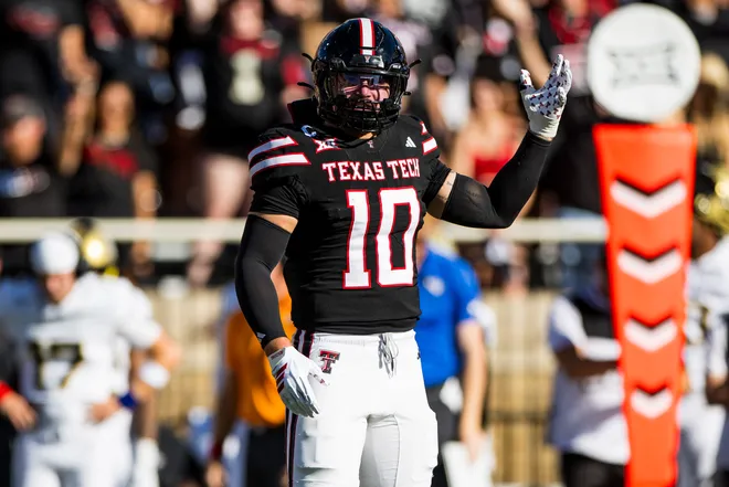 LUBBOCK, TEXAS - NOVEMBER 15: Jacob Rodriguez #10 of the Texas Tech Red Raiders gestures to the crowd during the first half of the game against the UCF Knights at Jones AT&T Stadium on November 15, 2025 in Lubbock, Texas. (Photo by John E. Moore III/Getty Images)