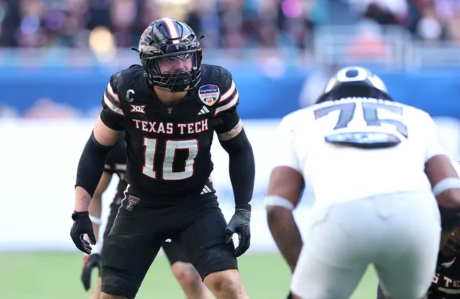 MIAMI GARDENS, FLORIDA - JANUARY 01: Jacob Rodriguez #10 of the Texas Tech Red Raiders lines up against the Oregon Ducks during the fourth quarter of the 2025 College Football Playoff Quarterfinal at the Capital One Orange Bowl at Hard Rock Stadium on January 01, 2026 in Miami Gardens, Florida. (Photo by Kevin C. Cox/Getty Images)