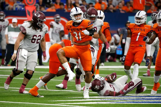 SAN ANTONIO, TX - SEPTEMBER 24: Linebacker Trey Moore #31 of the UTSA Roadrunners celebrates a hit on a Texas Southern Tigers runner the Alamodome on September 24, 2022 in San Antonio, Texas. (Photo by Ronald Cortes/Getty Images)