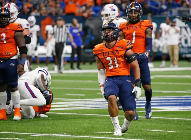 SAN ANTONIO, TX - NOVEMBER 12: Linebacker Trey Moore #31 of the UTSA Roadrunners celebrates after his sack and fumble recover against Louisiana Tech Bulldogs in the second half at Alamodome on November 12, 2022 in San Antonio, Texas. (Photo by Ronald Cortes/Getty Images)