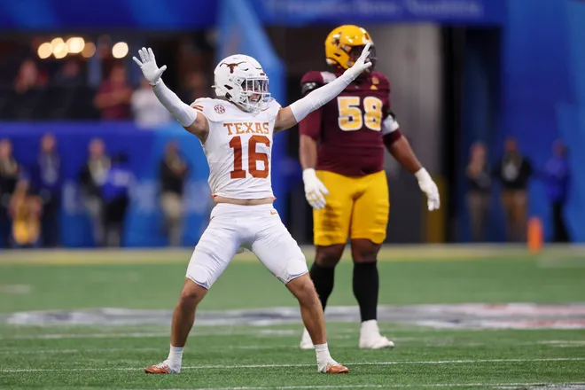 Jan 1, 2025; Atlanta, GA, USA; Texas Longhorns defensive back Michael Taaffe (16) reacts after a play against the Arizona State Sun Devils during the first half of the Peach Bowl at Mercedes-Benz Stadium. Mandatory Credit: Brett Davis-Imagn Images