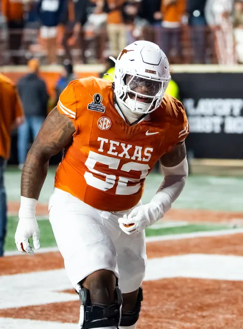 Dec 21, 2024; Austin, Texas, USA; Texas Longhorns offensive lineman DJ Campbell (52) against the Clemson Tigers during the CFP National playoff first round at Darrell K Royal-Texas Memorial Stadium. Mandatory Credit: Mark J. Rebilas-Imagn Images