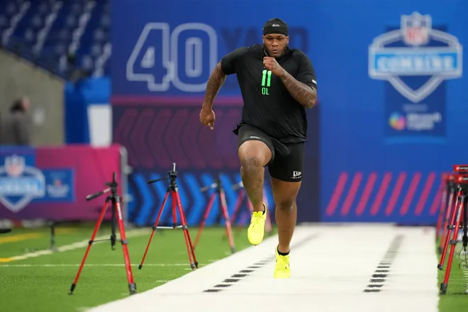Mar 1, 2026; Indianapolis, IN, USA; Texas offensive lineman DJ Campbell (OL11) during the NFL Scouting Combine at Lucas Oil Stadium. Mandatory Credit: Kirby Lee-Imagn Images