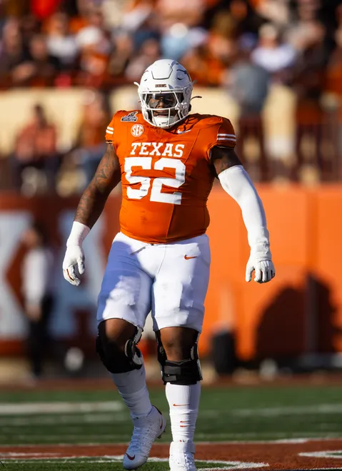 Dec 21, 2024; Austin, Texas, USA; Texas Longhorns offensive lineman DJ Campbell (52) against the Clemson Tigers during the CFP National playoff first round at Darrell K Royal-Texas Memorial Stadium. Mandatory Credit: Mark J. Rebilas-Imagn Images