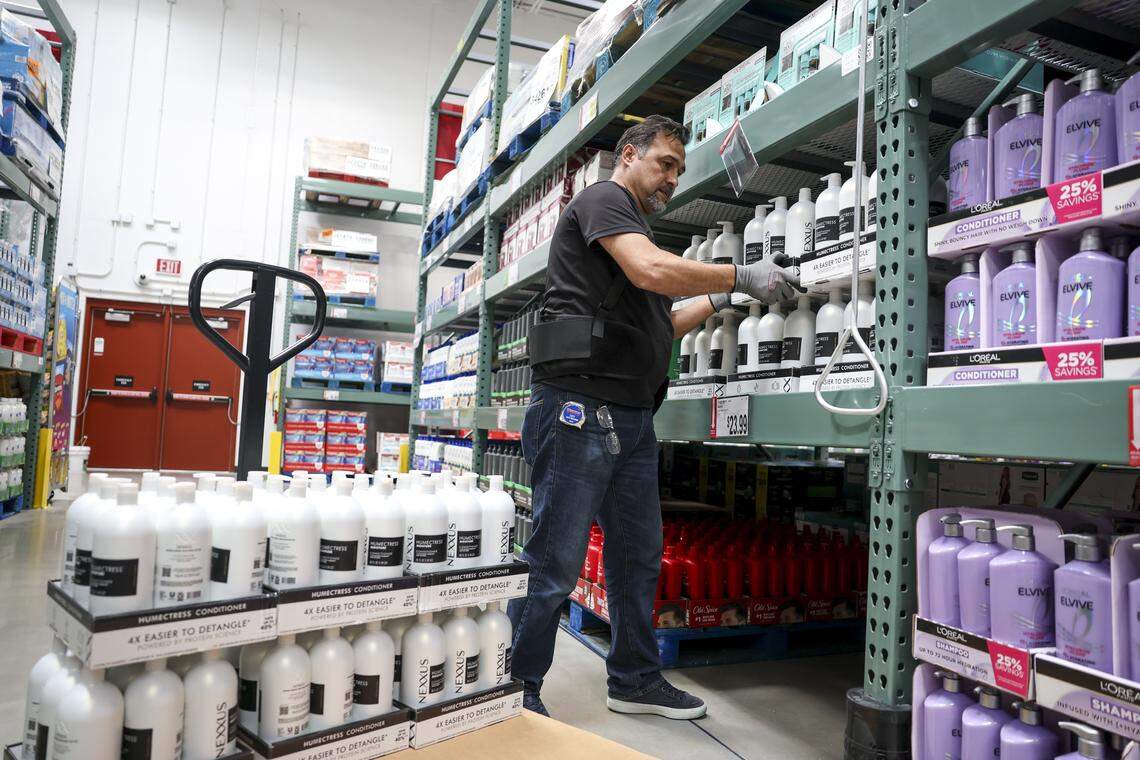 Aykut Demirel stocks shelves at BJ's Wholesale Club at 7241 Harris Parkway in Fort Worth on Friday, April 24, 2026. Demirel is based in New Jersey and helps the company open new locations.