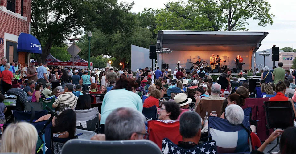 A crowd watches the live music of ShinyRibs during the annual Wein & Saengerfest in downtown New Braunfels on Saturday, May 7, 2016. (Stephen Spillman)