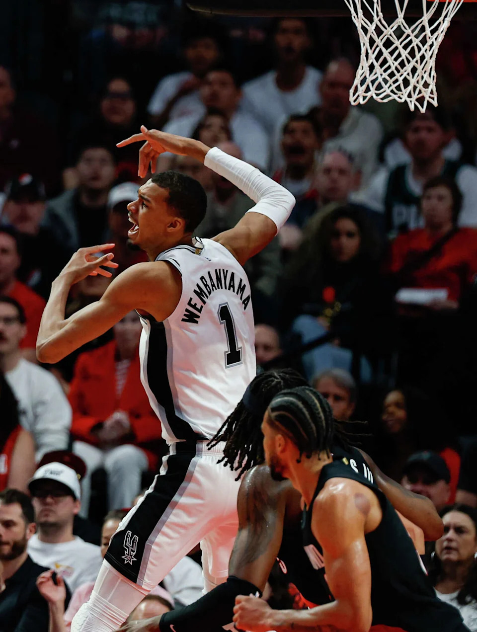 San Antonio Spurs forward Victor Wembanyama (1) reacts to a foul call on the Spurs during the second quarter of Game 4 of a first-round NBA playoff series against the Portland Trail Blazers at Moda Center on Sunday, April 26, 2026. (Sam Owens/San Antonio Express-News)