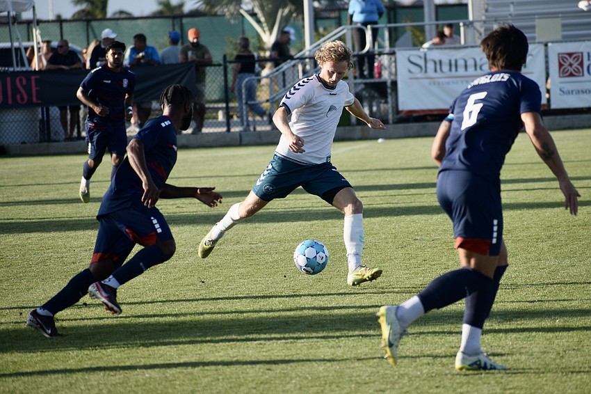 Midfielder Ethan Bryant (center) weaves through Corpus Christi FC defenders. He's registered three shots in seven games played. Midfielder Ethan Bryant (center) weaves through Corpus Christi FC defenders. He's registered three shots in seven games played.