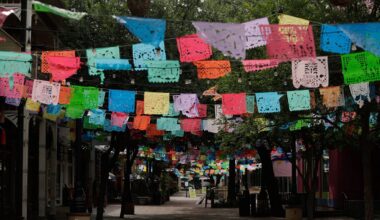 Papel picado decorates a closed Market Square in downtown San Antonio, Thursday, April 16, 2020. (AP Photo/Eric Gay)