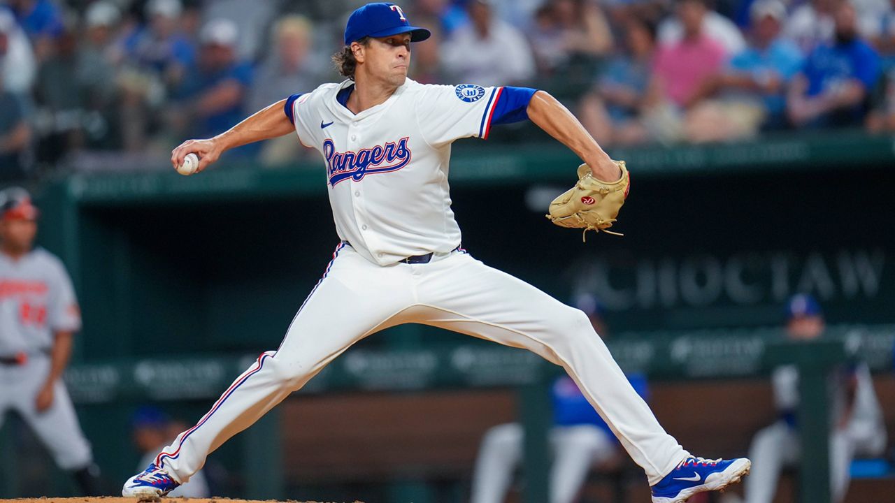 Texas Rangers starting pitcher Jacob deGrom throws a pitch to the Baltimore Orioles during the fourth inning of a baseball game Tuesday, July 1, 2025, in Arlington, Texas. (AP Photo/Julio Cortez)