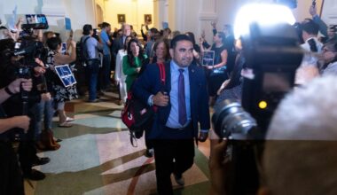 Texas State Rep. Armando Walle enters the house chambers at the Texas Capitol in Austin, Texas, Tuesday, Aug. 18, 2025. (AP Photo/Stephen Spillman)