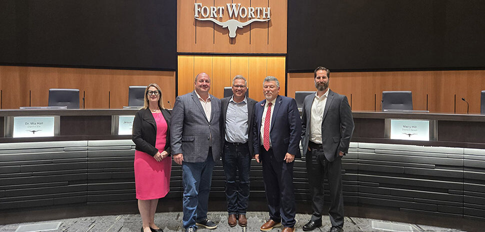 Motion carries: Kelly Baggett, Fort Worth Innovation Coordinator; District 10 Councilmember Alan Blaylock; John Lauer, Founder and CEO of Adom Industries; City Manager Jay Chapa; and Michael Hennig, Economic Development Manager, in chambers after Fort Worth City Council unanimously approved $15 million in incentives for Adom's $229 million cloud-connected electronics factory Tuesday night.