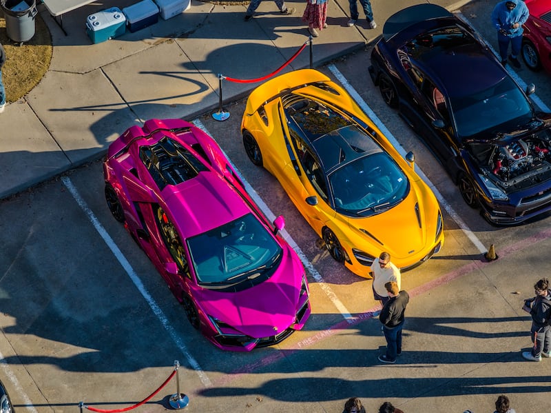Cars are parked in a meetinghouse parking lot Plano, Texas, for a "Cars and Christ" event on Saturday morning, Feb. 7, 2026.