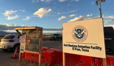 A sign marks the entrance to a series of hardened tents at the Camp East Montana immigrant detention center in the desert at a U.S. Army base on the outskirts of El Paso, Texas, Friday, Feb. 13, 2026. (AP Photo/Morgan Lee)