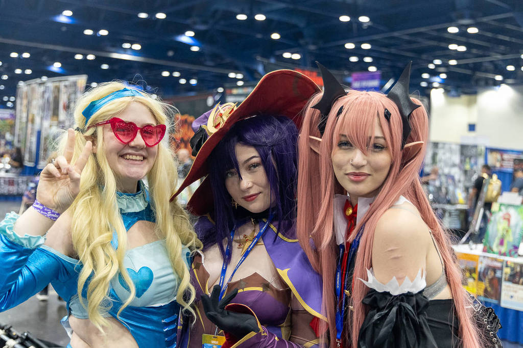 Image shows cosplayers posing at Comicpalooza in Houston. 
