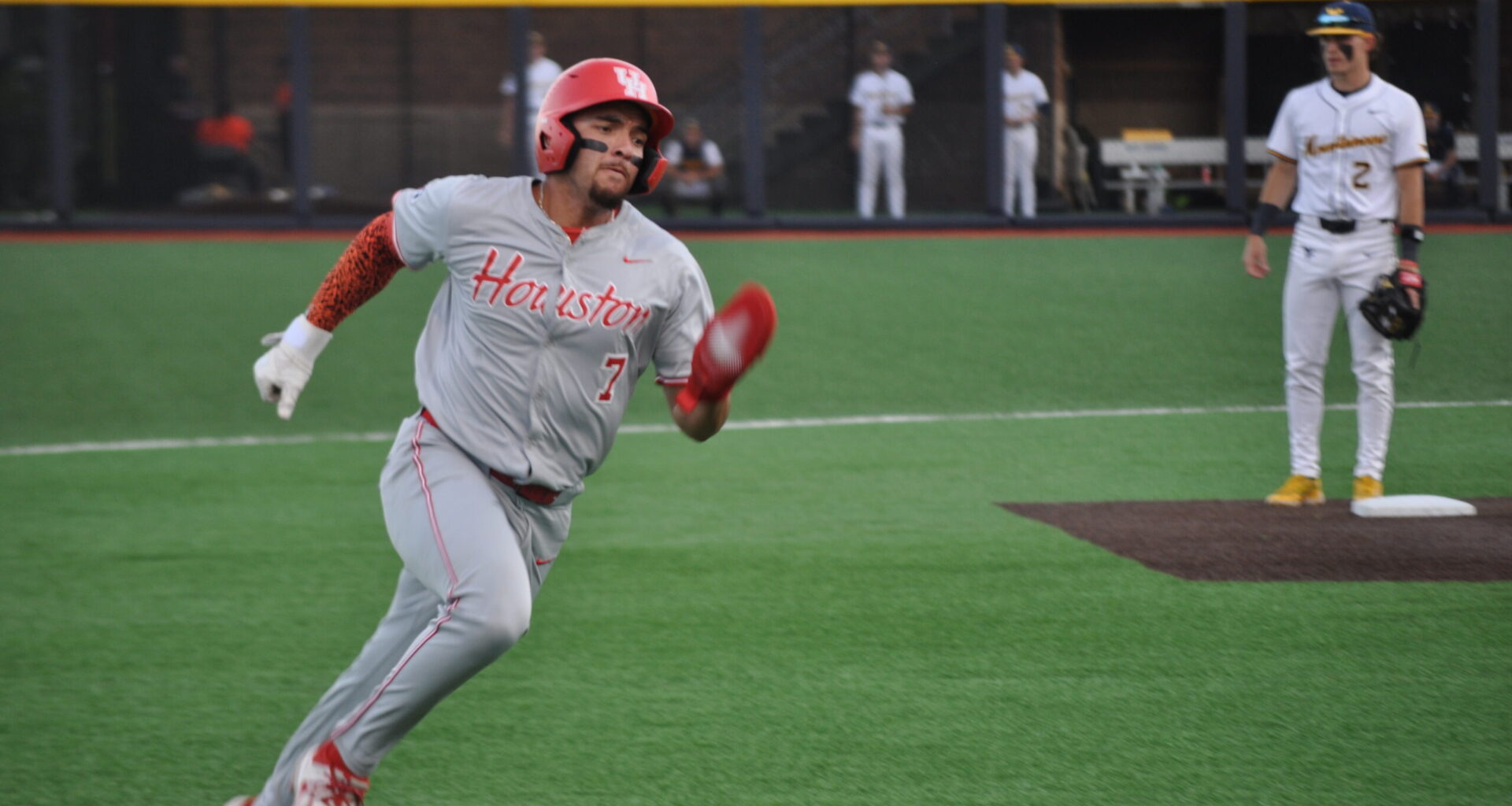 Houston pounds out six extra-base hits, upends No. 15 West Virginia, 10-7