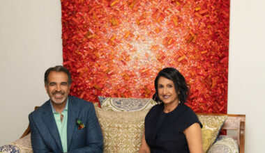 Gowri and Alex Sharma pose for a portrait at home in Dallas