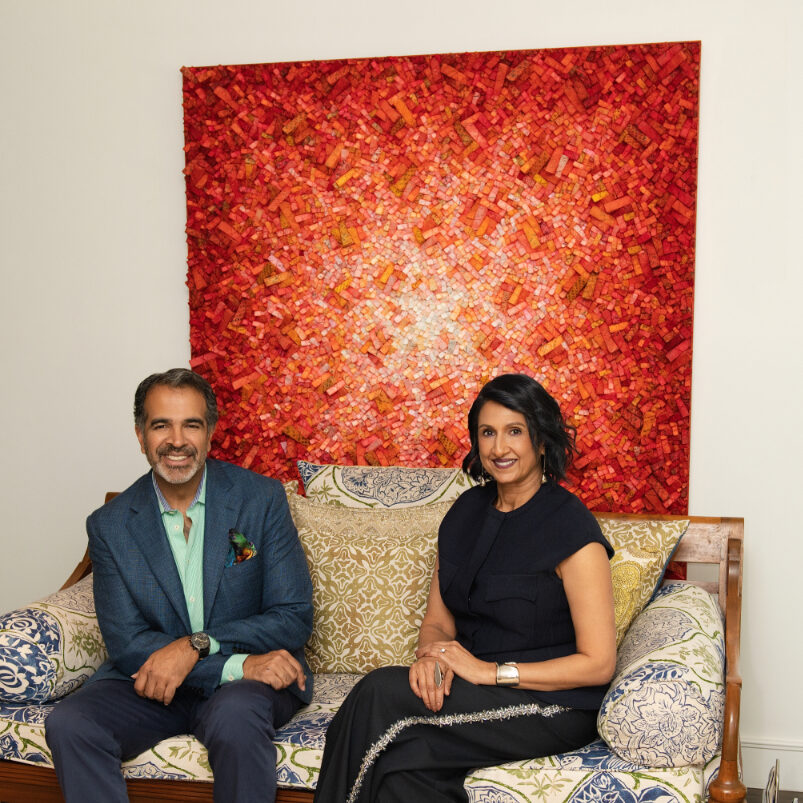 Gowri and Alex Sharma pose for a portrait at home in Dallas