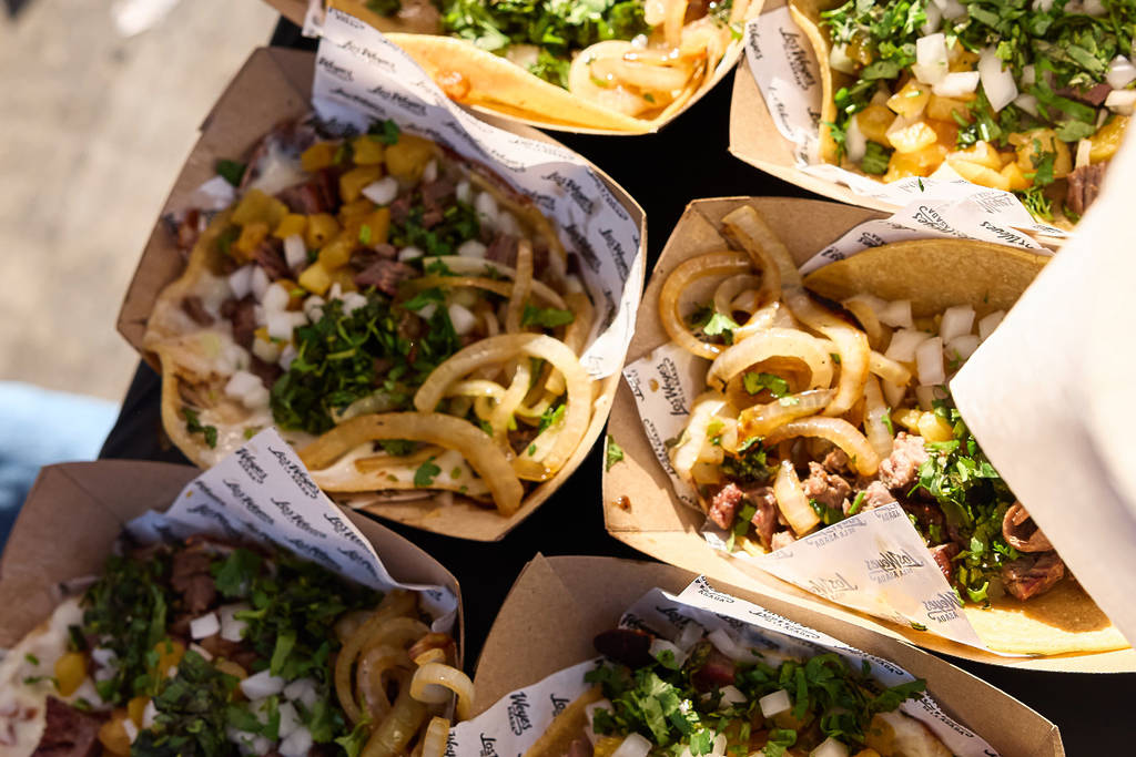 Image shows a tray of tacos as featured at Texas Monthly Taco Fest in Houston. 