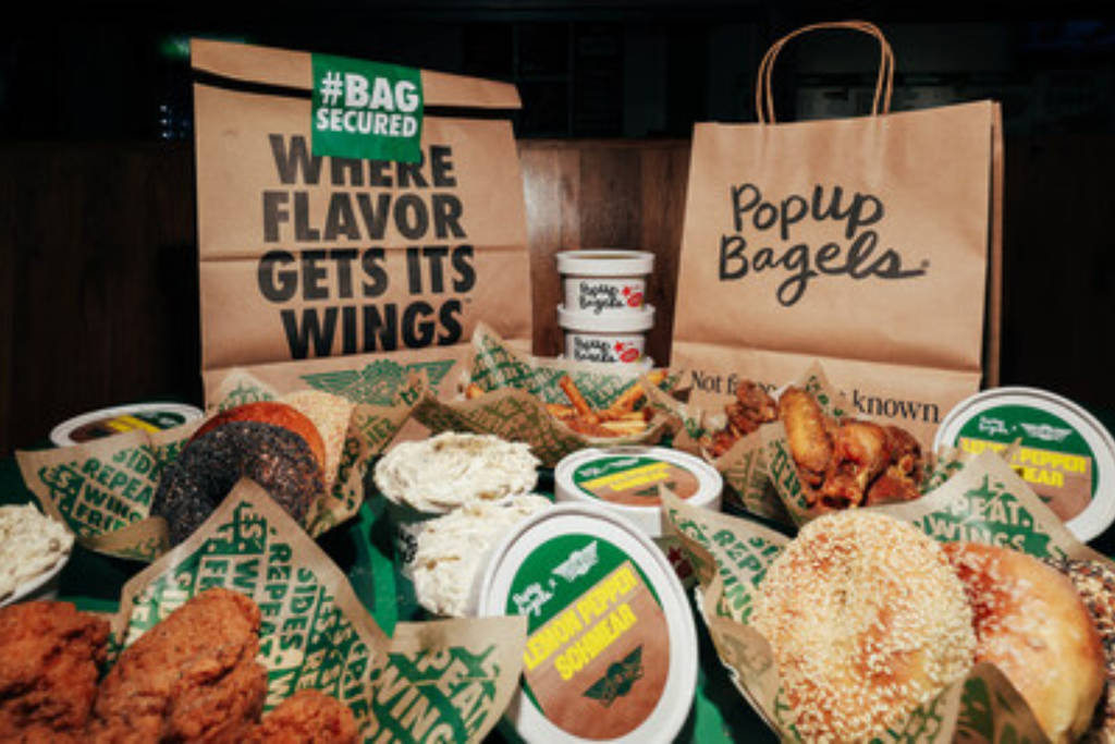 Image shows a selection of bagels and Wingfest bags. 