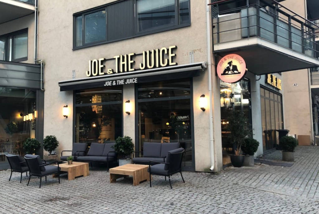 Image shows the exterior of a Joe & The Juice cafe. 