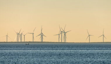 A wind farm is seen on the shore off the Laguna Madre near Port Isabel, Texas. Credit: Jon G. Fuller/VW Pics/Universal Images Group via Getty Images