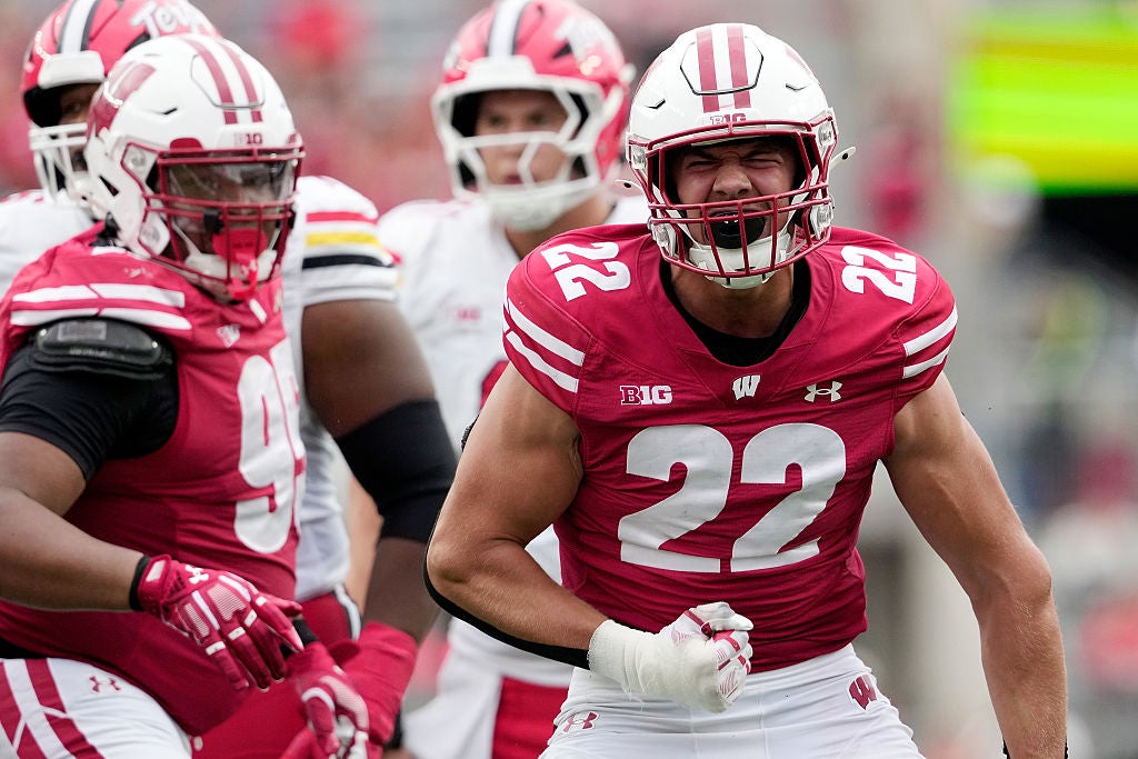 MADISON, WISCONSIN - SEPTEMBER 20: Mason Reiger #22 of the Wisconsin Badgers reacts after a sack in the third quarter against the Maryland Terrapins at Camp Randall Stadium on September 20, 2025 in Madison, Wisconsin. (Photo by John Fisher/Getty Images)