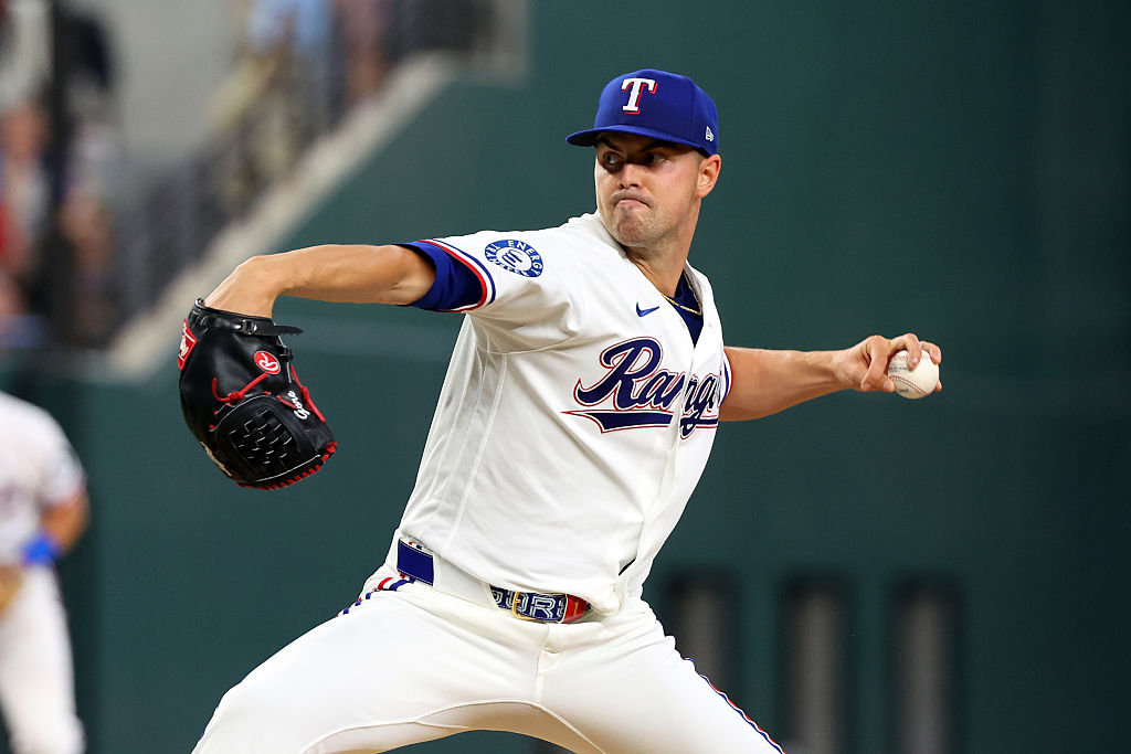 ARLINGTON, TEXAS - APRIL 03: Starting pitcher MacKenzie Gore #1 of the Texas Rangers delivers a pitch agaisnt the Cincinnati Reds in the first inning at Globe Life Field on April 03, 2026 in Arlington, Texas. (Photo by Richard Rodriguez/Getty Images)